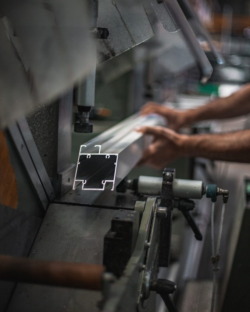 man-working-in-a-workshop-with-aluminum-2023-11-27-05-24-50-utc (1)